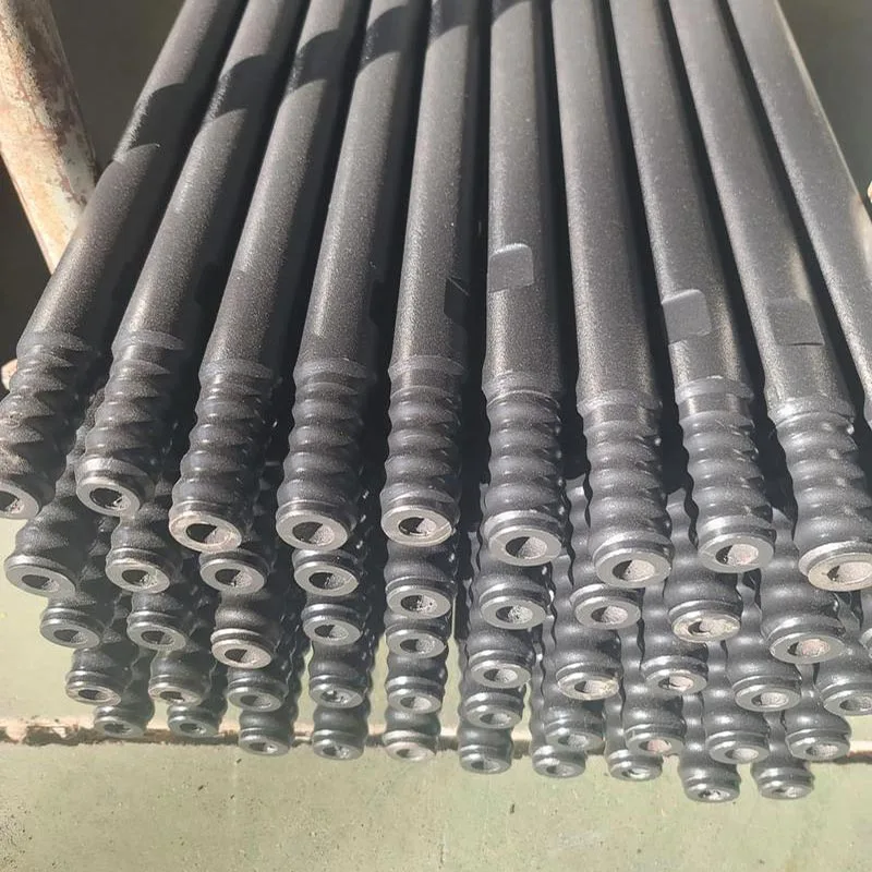 Top hammer drill rod